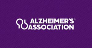 A purple background with the alzheimer 's association logo.