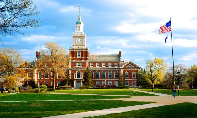 A large building with a clock tower on top of it.
