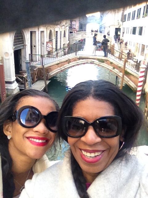 Two women in sunglasses taking a selfie