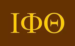 A brown background with yellow letters that say 