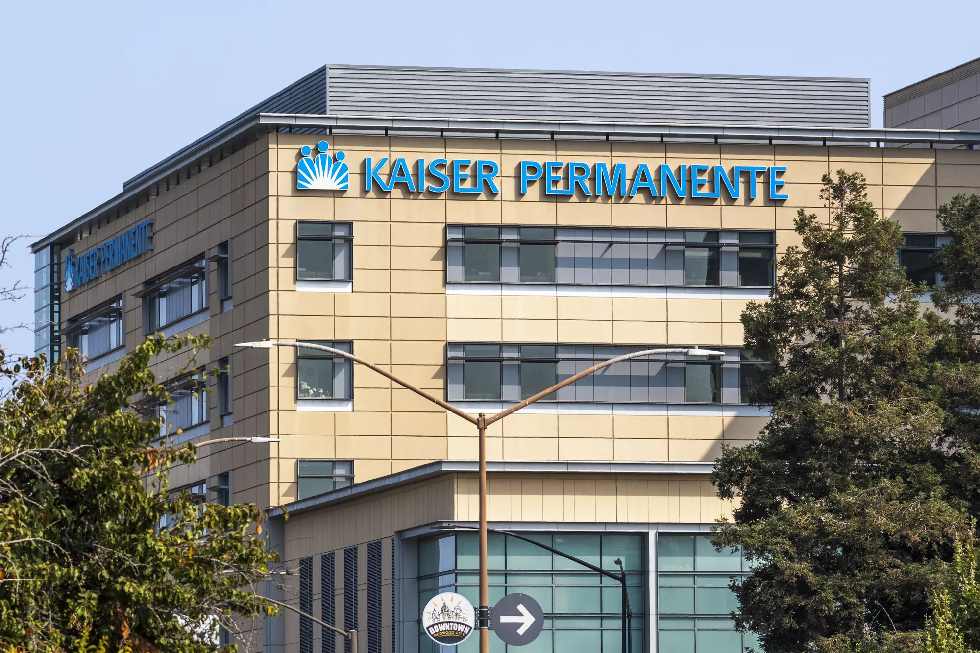 Kaiser permanente building with a sign on the side.