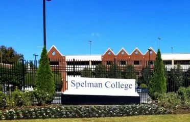 A building with a sign that says spelman college.