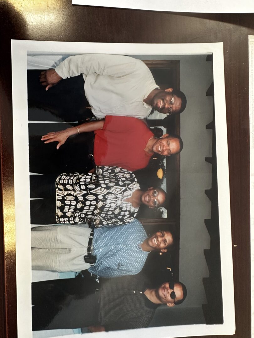 A group of people standing next to each other.