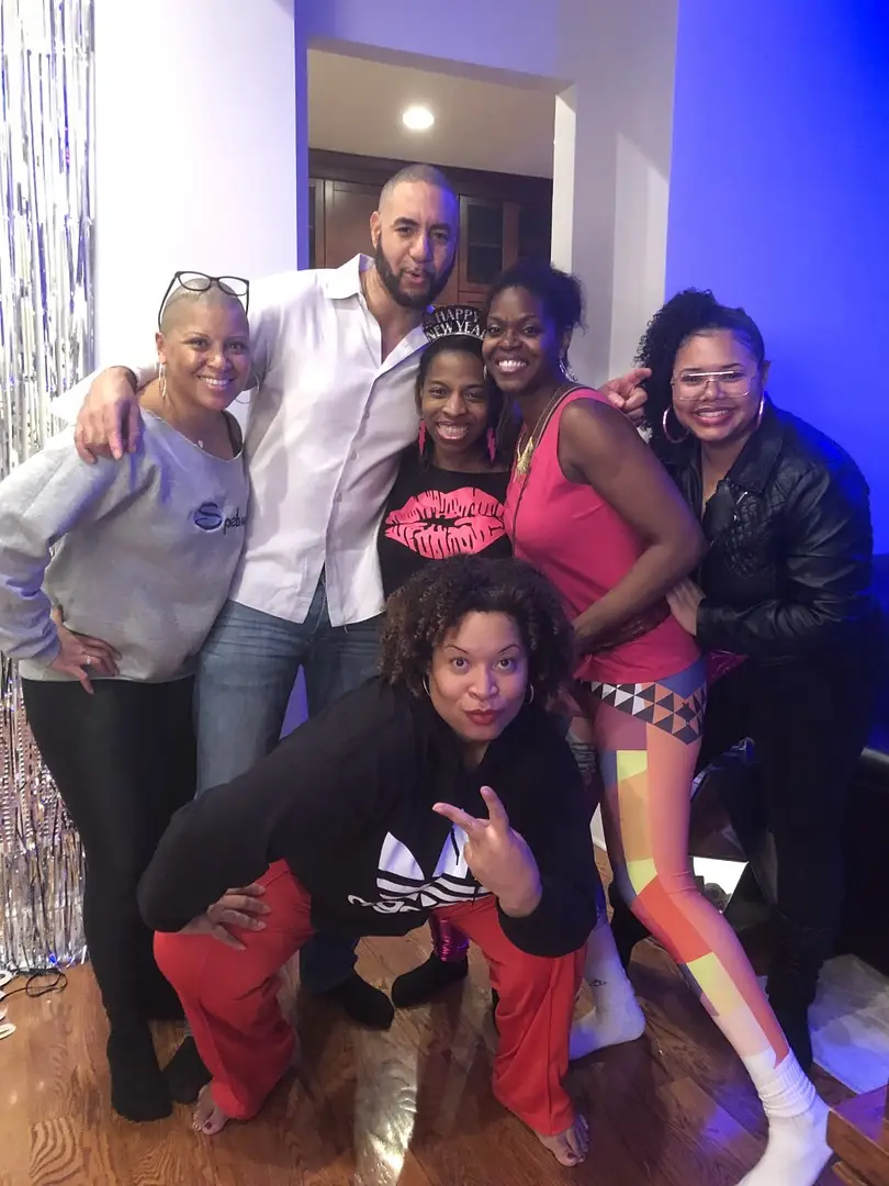 A group of people posing for the camera.