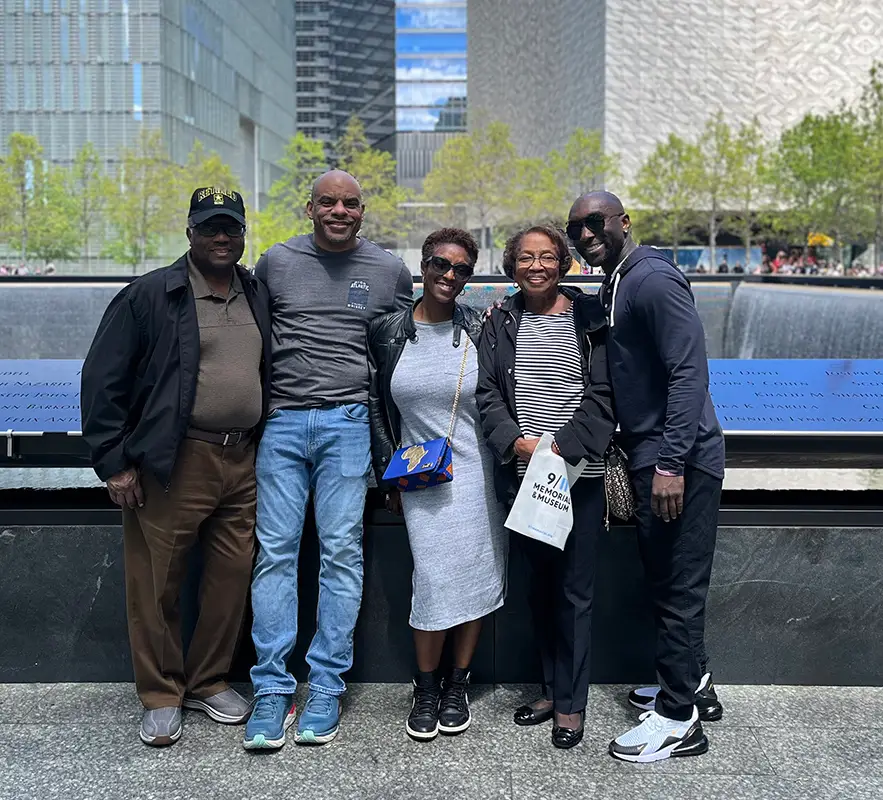 A group of people standing next to each other.