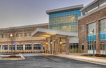 A large building with a lot of windows on it