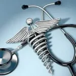 A stethoscope and other medical equipment on top of a table.